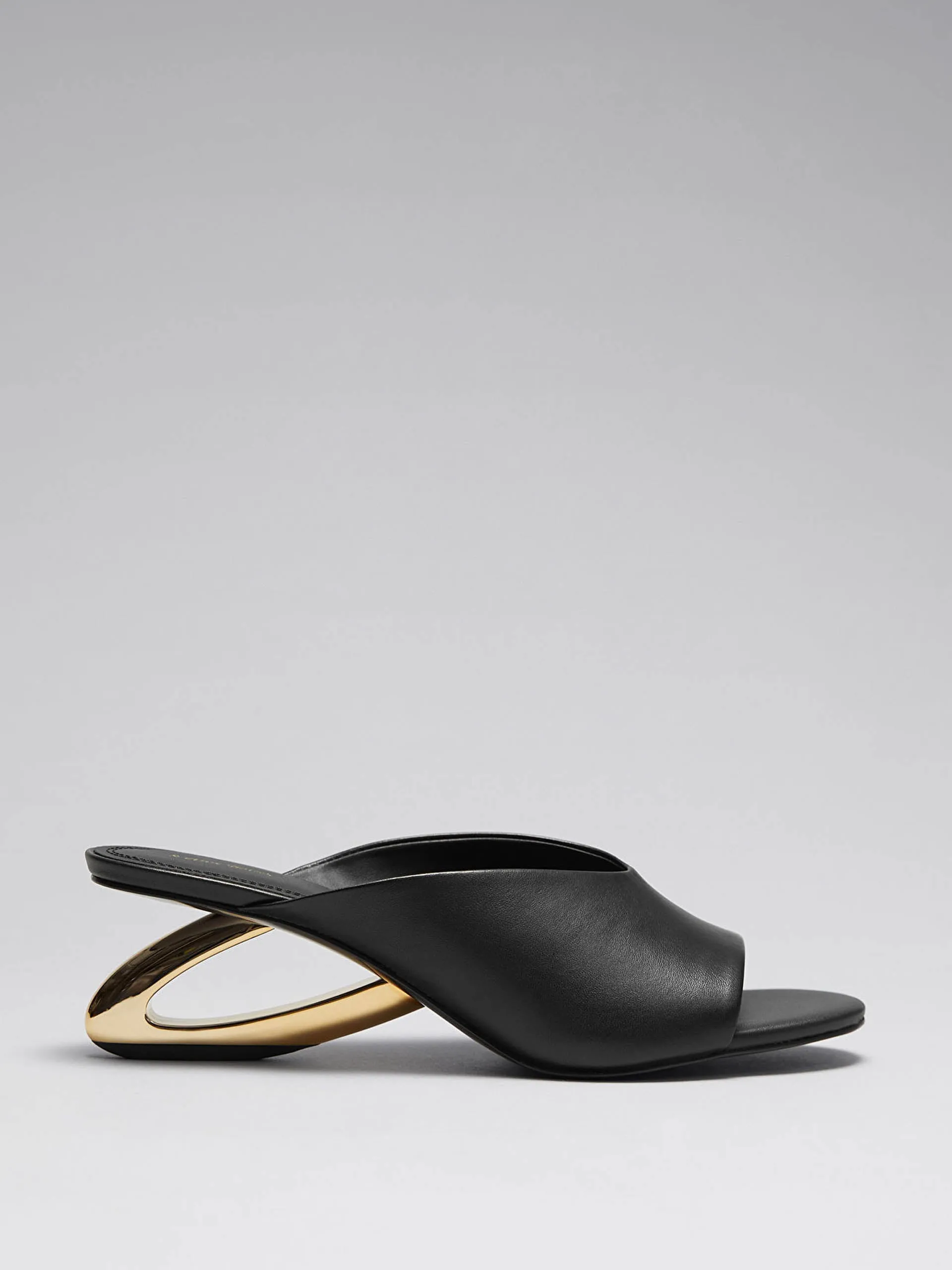 Golden heel mules